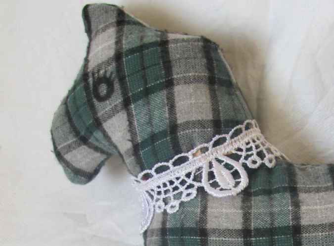 large image of art item: doll – horse checkered