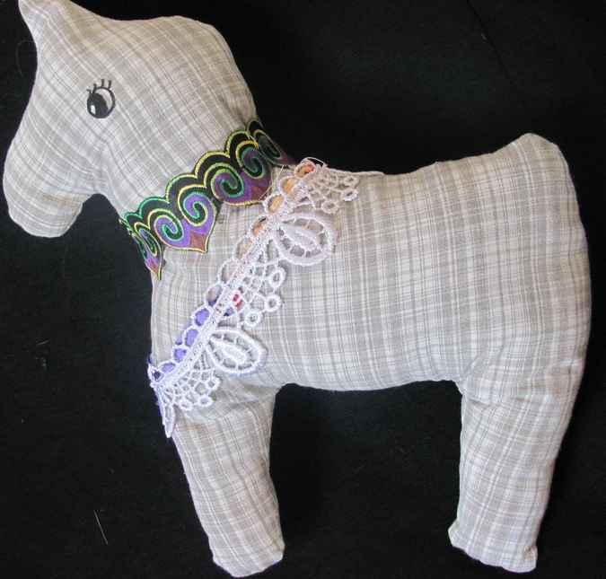 large image of art item: doll – horse checkered