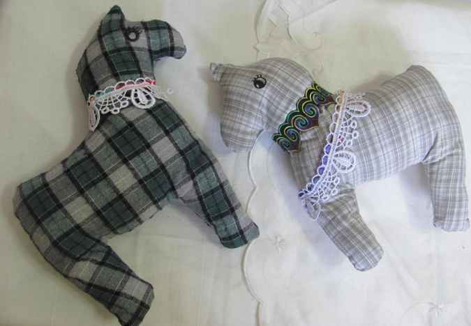 large image of art item: doll – horse checkered