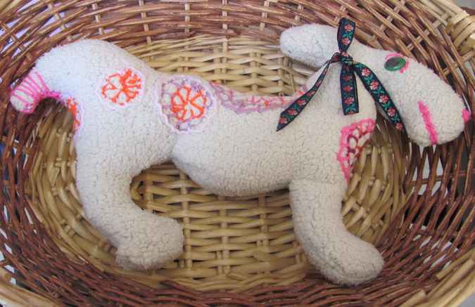 large image of art item: doll – horsy with flowers