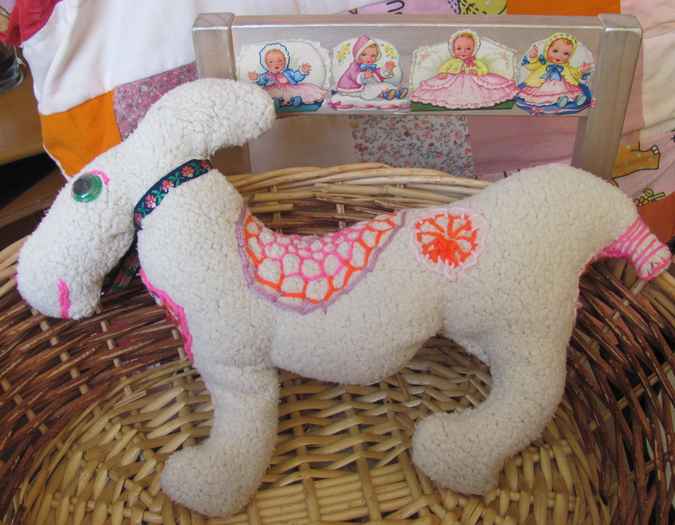 large image of art item: doll – horsy with flowers