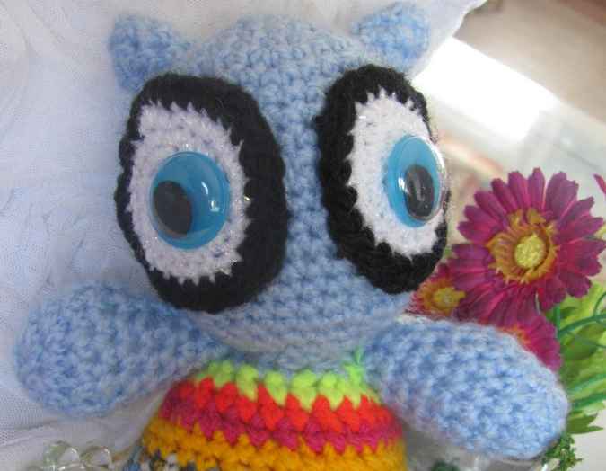 large image of art item: doll – owl cyan crochet