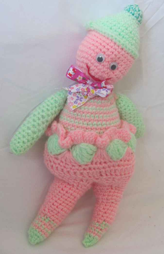 large image of art item: doll – pink green doll crochet