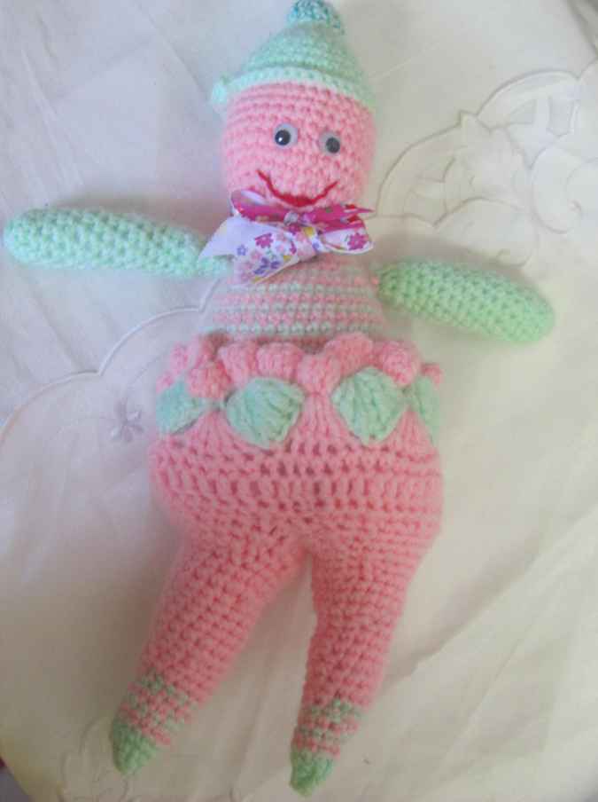 large image of art item: doll – pink green doll crochet