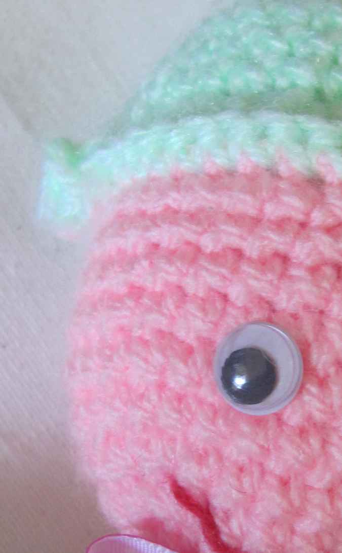 large image of art item: doll – pink green doll crochet