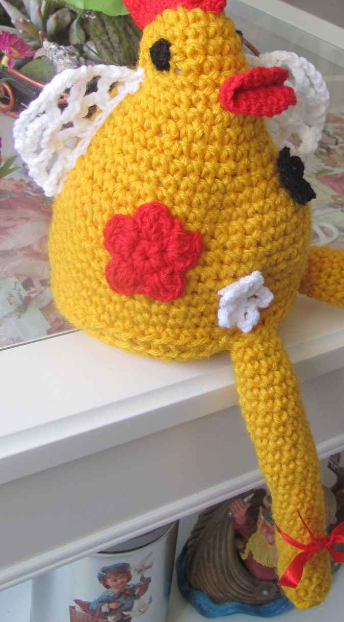 large image of art item: doll – rooster with flowers