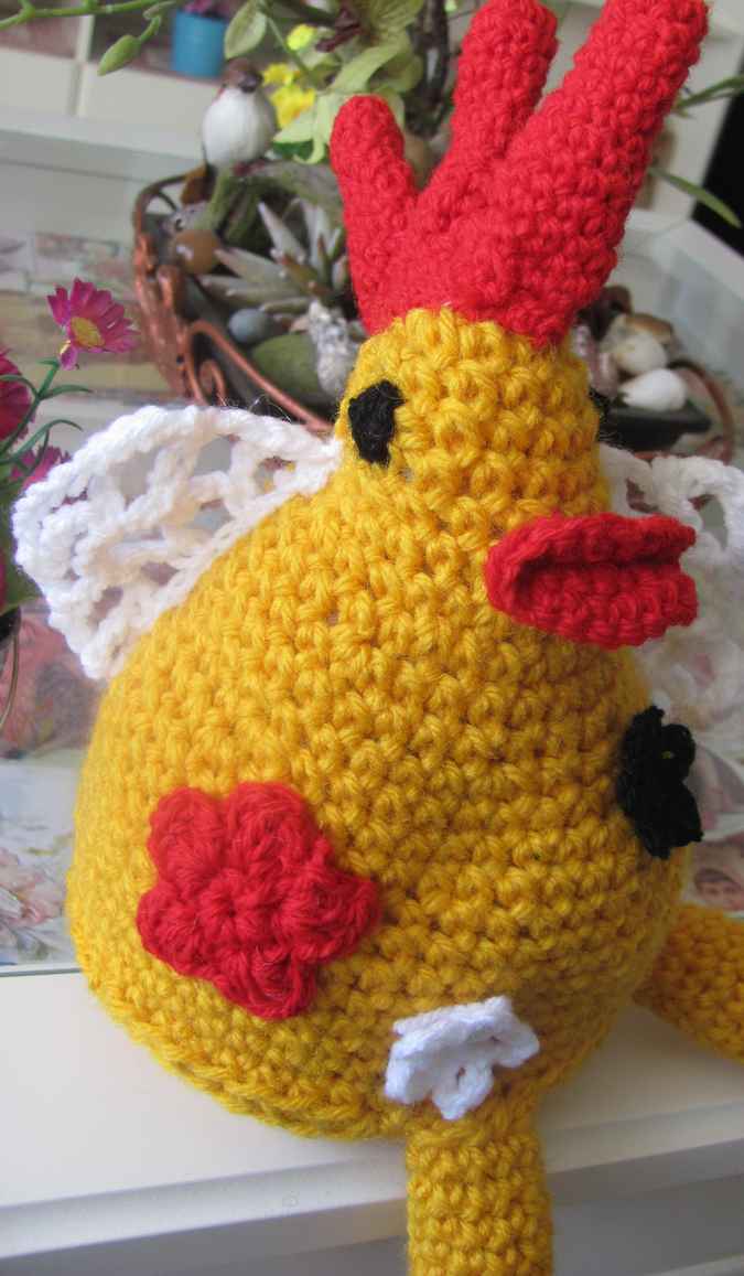 large image of art item: doll – rooster with flowers