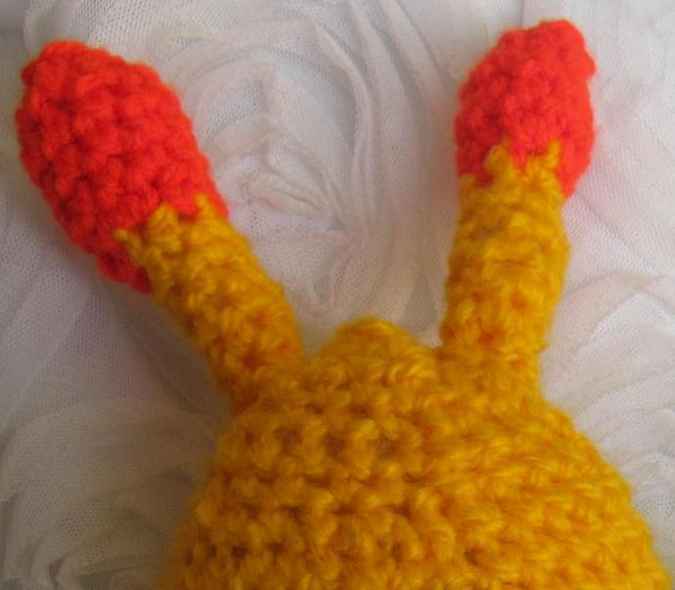 large image of art item: doll – snail crochet