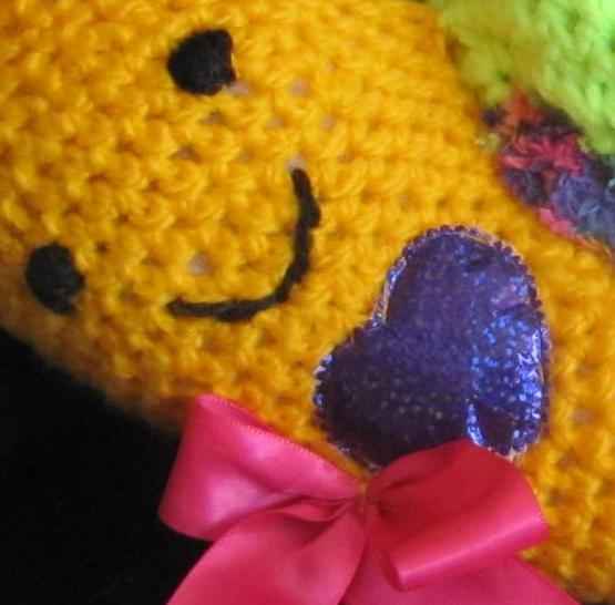 large image of art item: doll – snail crochet
