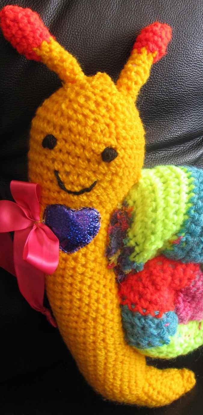 large image of art item: doll – snail crochet