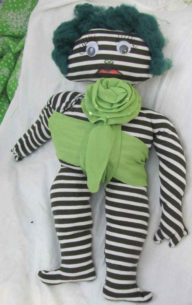 large image of art item: doll – striped quilt