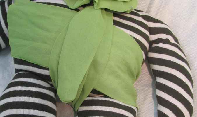 large image of art item: doll – striped quilt