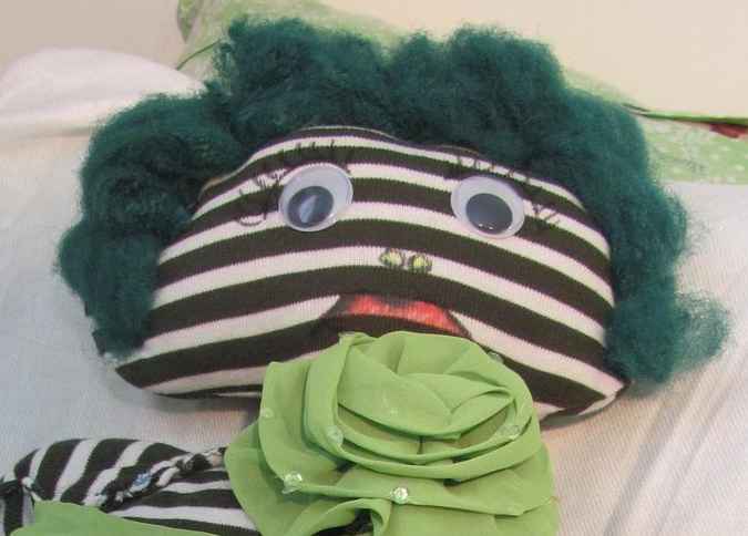 large image of art item: doll – striped quilt