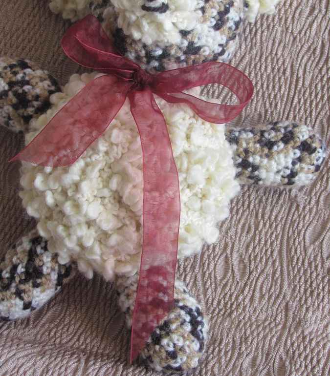 large image of art item: doll – teddy bear lace ribbon