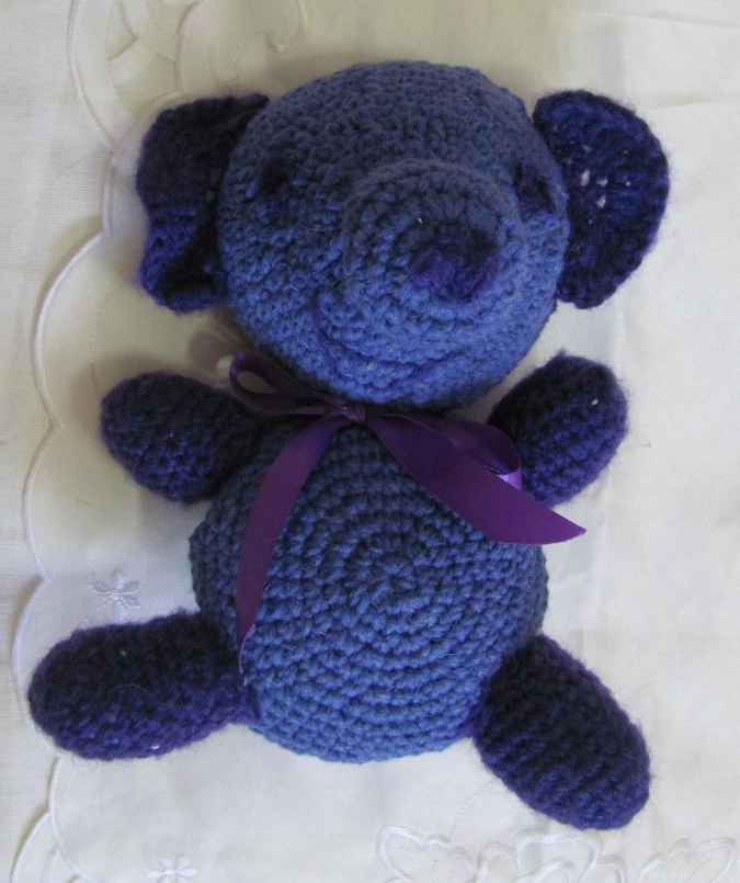 large image of art item: doll – teddy bear purple