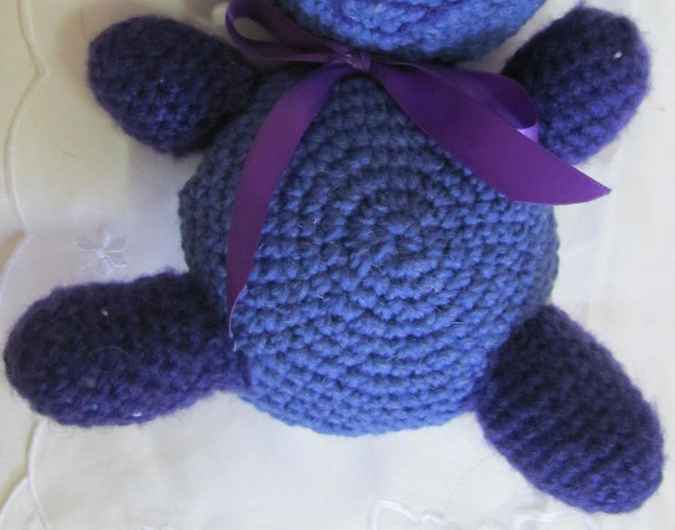large image of art item: doll – teddy bear purple