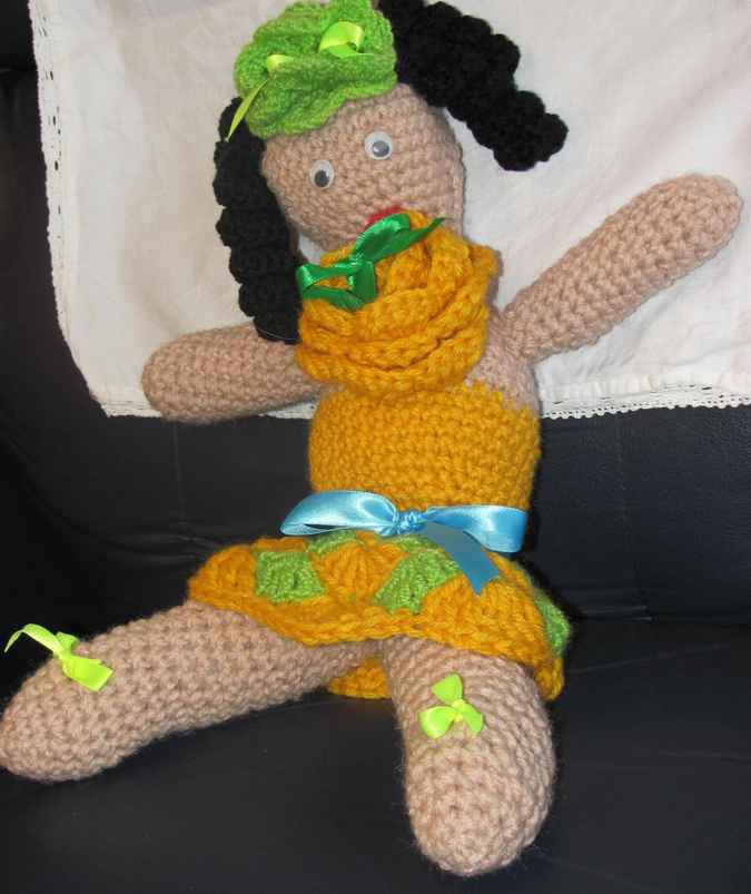 large image of art item: doll – yellow dress