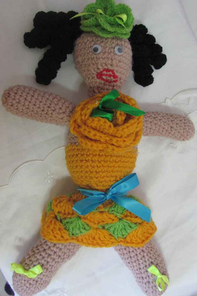 large image of art item: doll – yellow dress