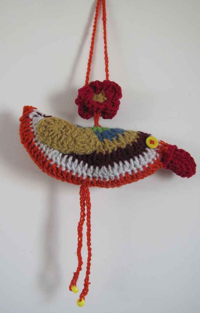 large image of art item: decor – bird crochet orange white