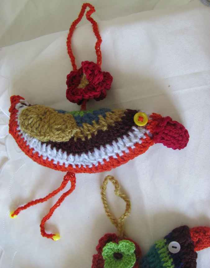 large image of art item: decor – bird crochet orange white