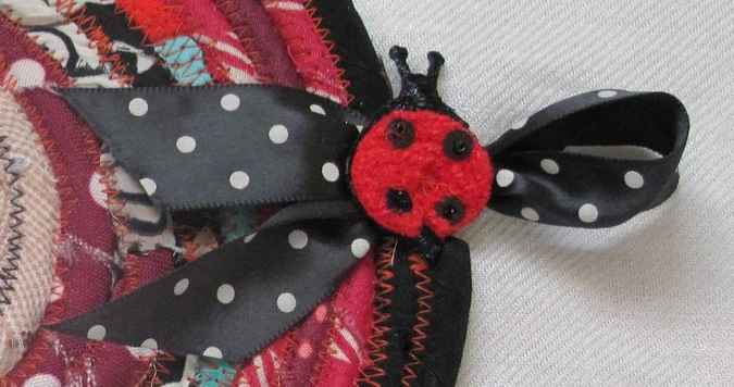 large image of art item: decor – potholder black crimson cream