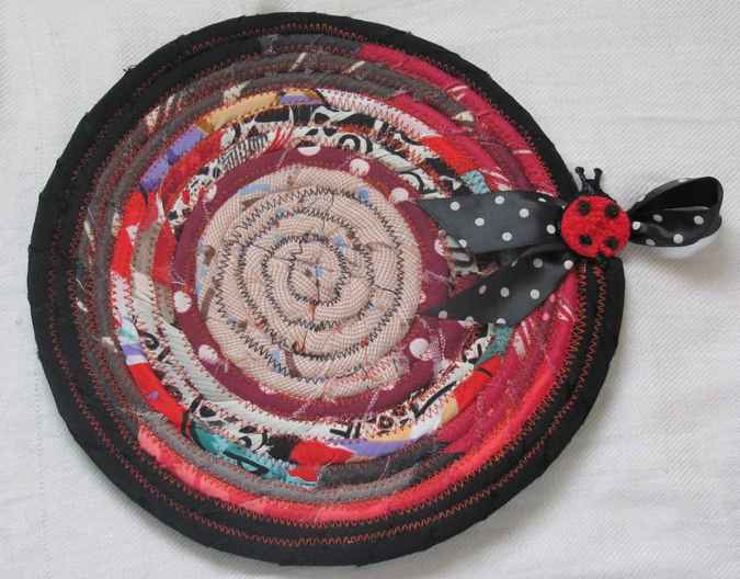 large image of art item: decor – potholder black crimson cream