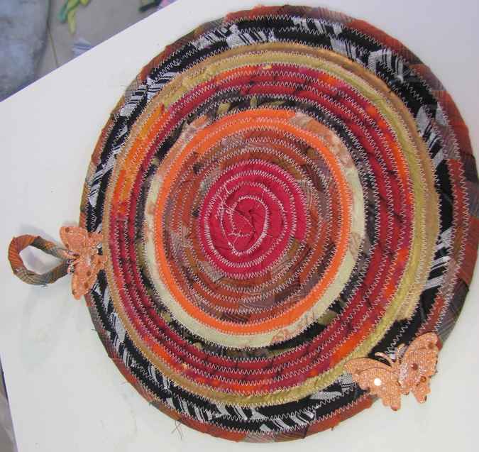 large image of art item: decor – potholder crimson orange ochre