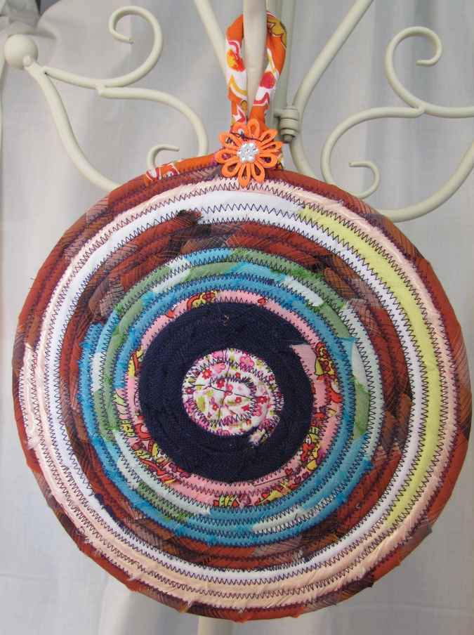 large image of art item: decor – potholder flower orange red white blue