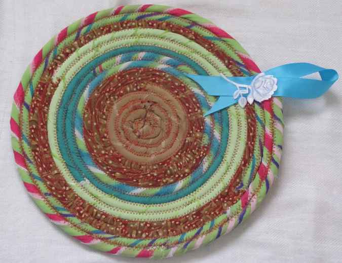 large image of art item: decor – potholder ribbon cyan brown green red
