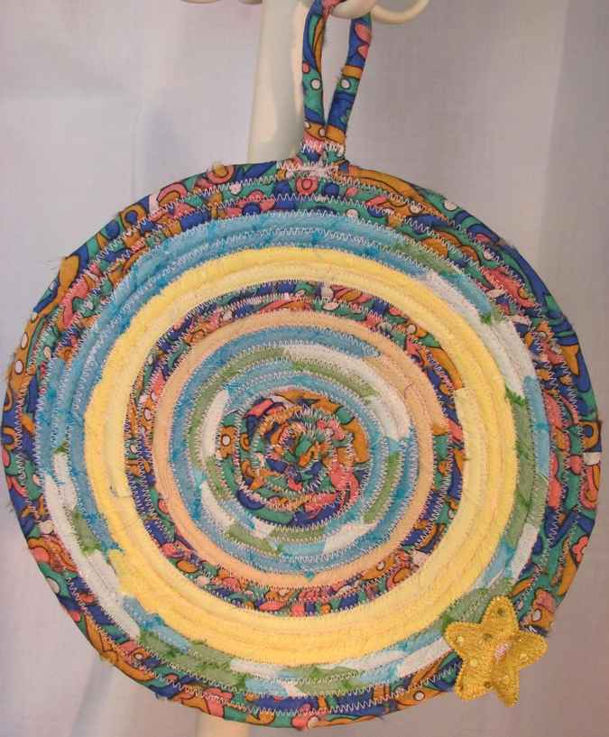 large image of art item: decor – potholder star yellow cyan orange