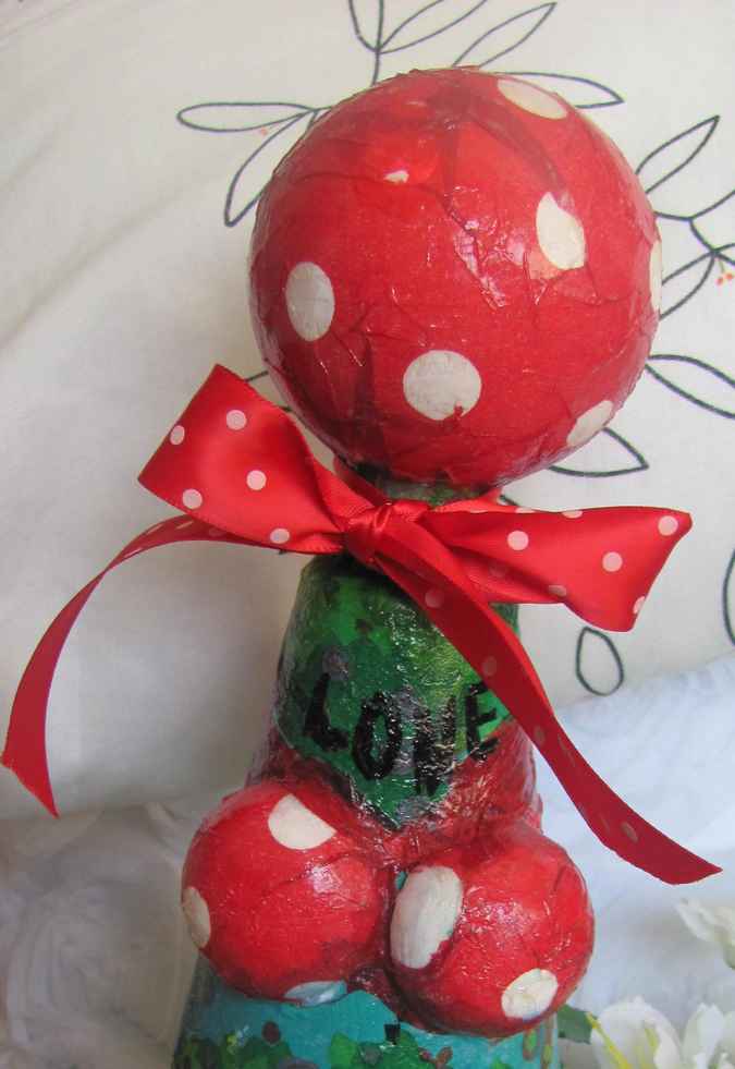 large image of art item: decor – flask green red white sphere mushroom