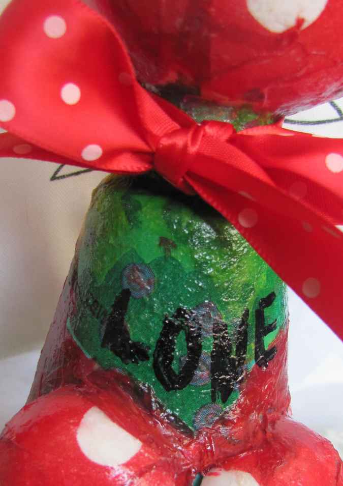 large image of art item: decor – flask green red white sphere mushroom