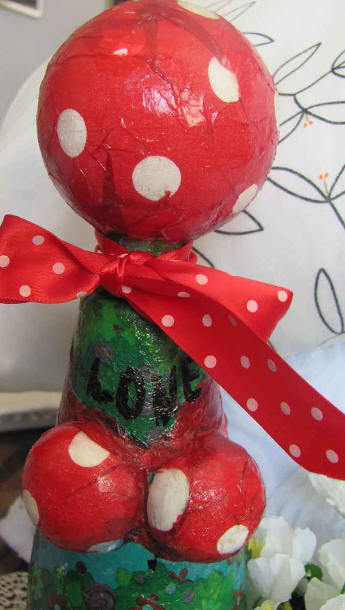 large image of art item: decor – flask green red white sphere mushroom