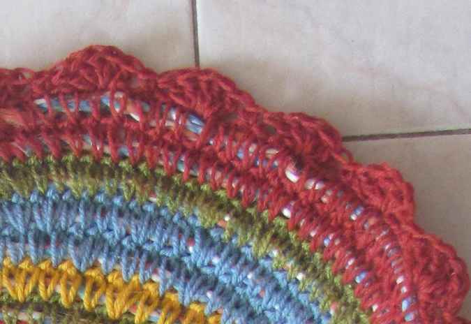 large image of art item: decor – rug darkred bluegreen yellow